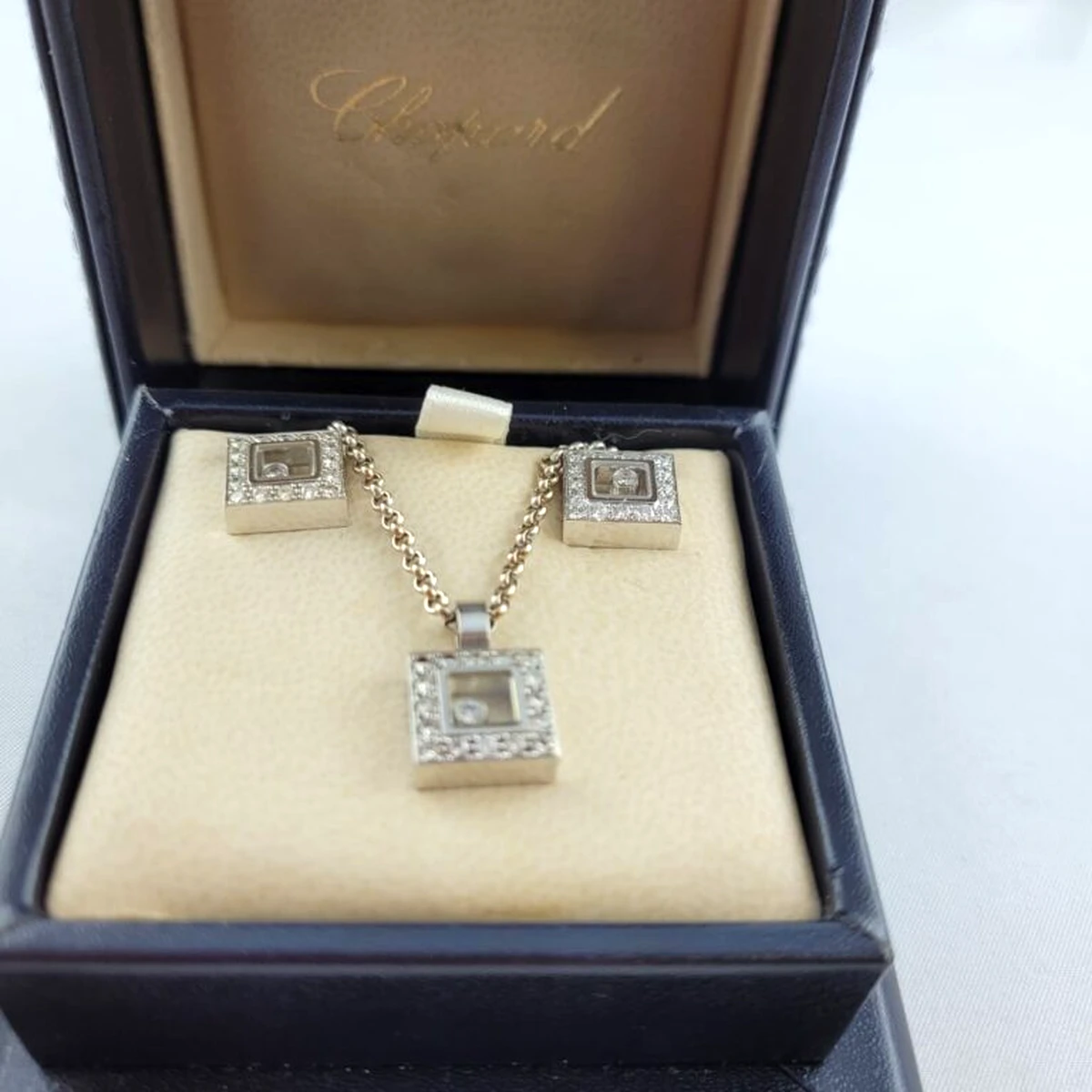 Parure Chopard boucles d'oreilles et collier or blanc & diamants